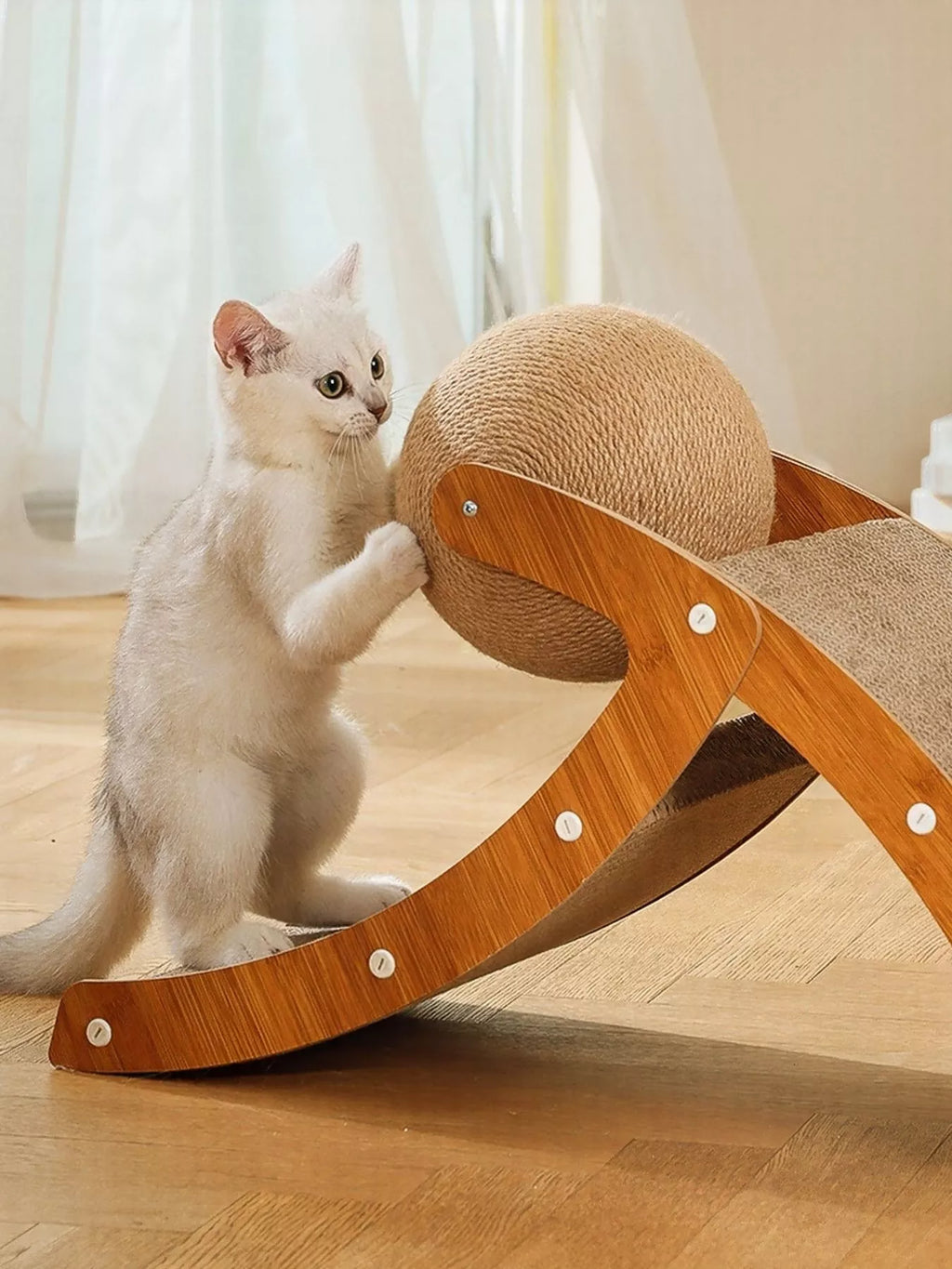 Interactive ball and ramp cat scratching post by Trendsi featuring a colorful ball, ramp, and scratching surface for cats.
