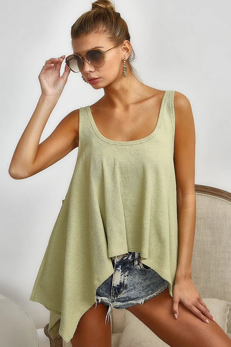 Trendsi BiBi high and low flare knit tank top in soft fabric, featuring a stylish high-low flare design and sleeveless fit.