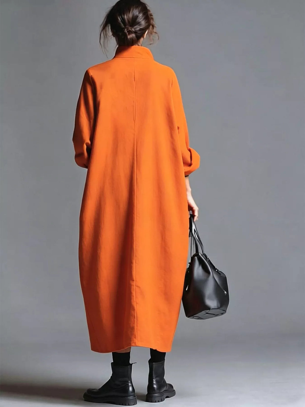 Plus size full-size loose-fit mock neck midi dress with pockets from Trendsi, featuring a comfortable, stylish design.