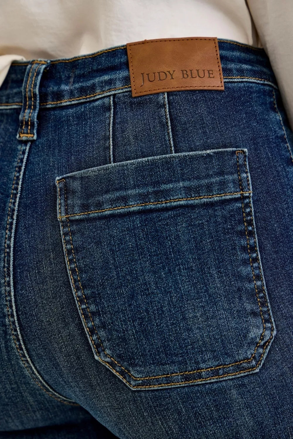 Trendsi Judy Blue high waist wide crop utility jeans with patch pockets, showcasing a stylish denim look with functional pockets.