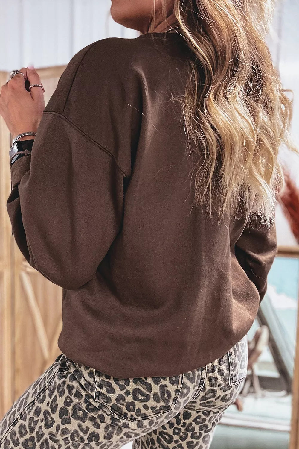 Dark brown crewneck sweatshirt with plaid PRAY graphic, view 4