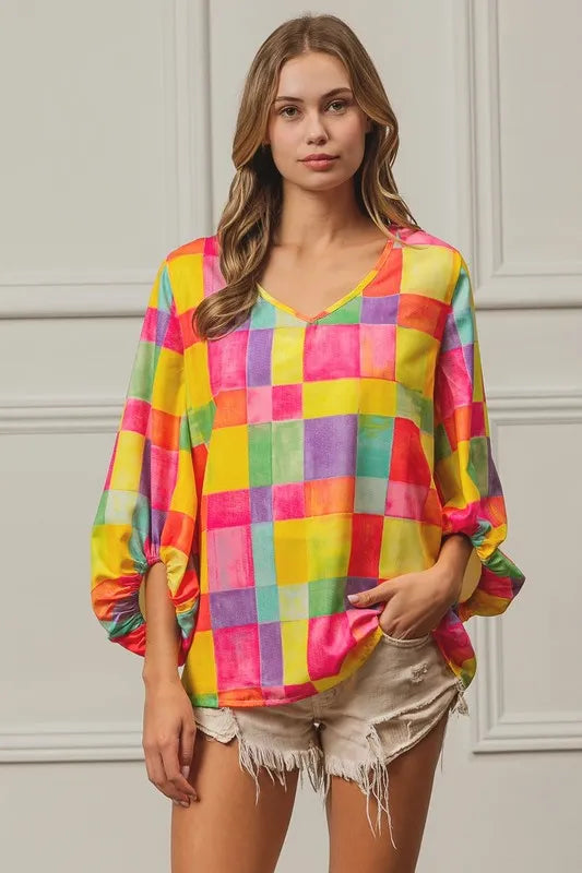 Colorful BiBi Multi Block Bubble Pop Balloon Top by Trendsi, featuring vibrant bubble designs and playful style.