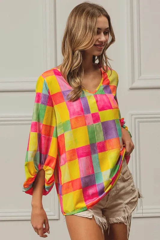Colorful BiBi Multi Block Bubble Pop Balloon top by Trendsi with vibrant, playful bubble design and bold block patterns.