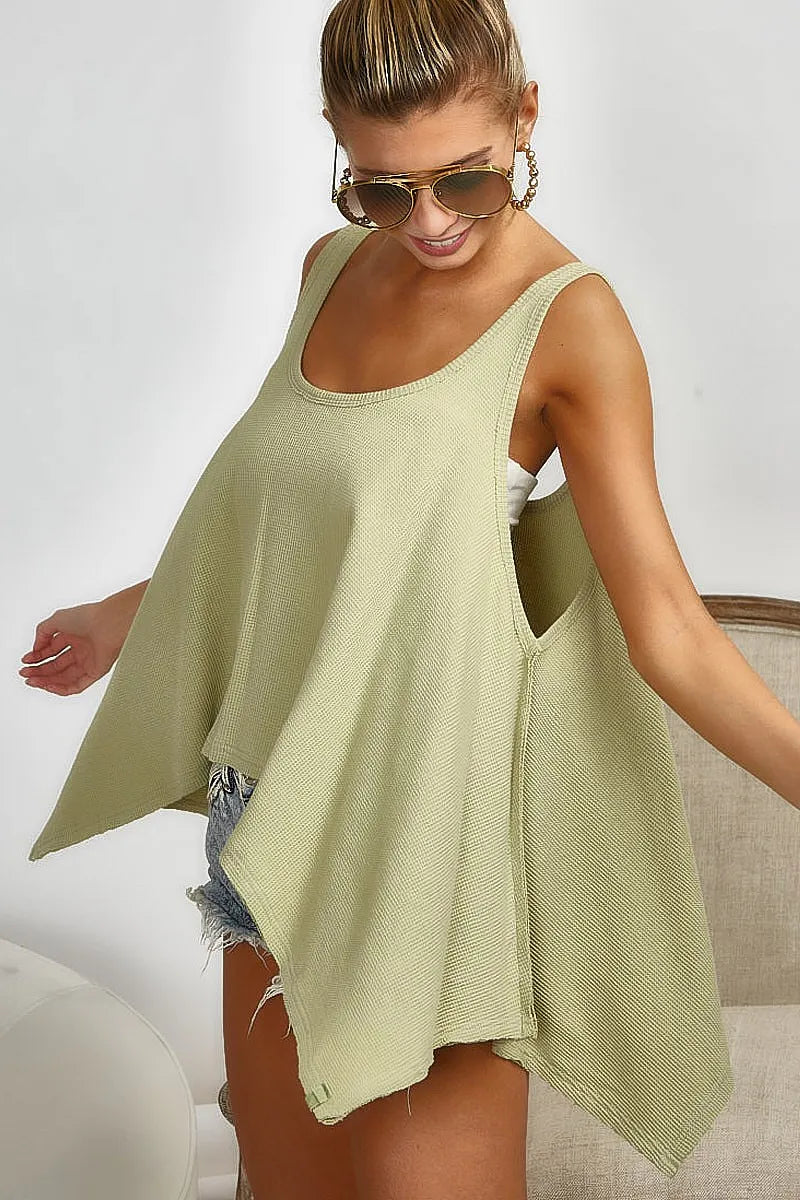 BiBi high and low flare knit tank top by Trendsi, front view showing fitted bodice with flared hem and ribbed knit texture.