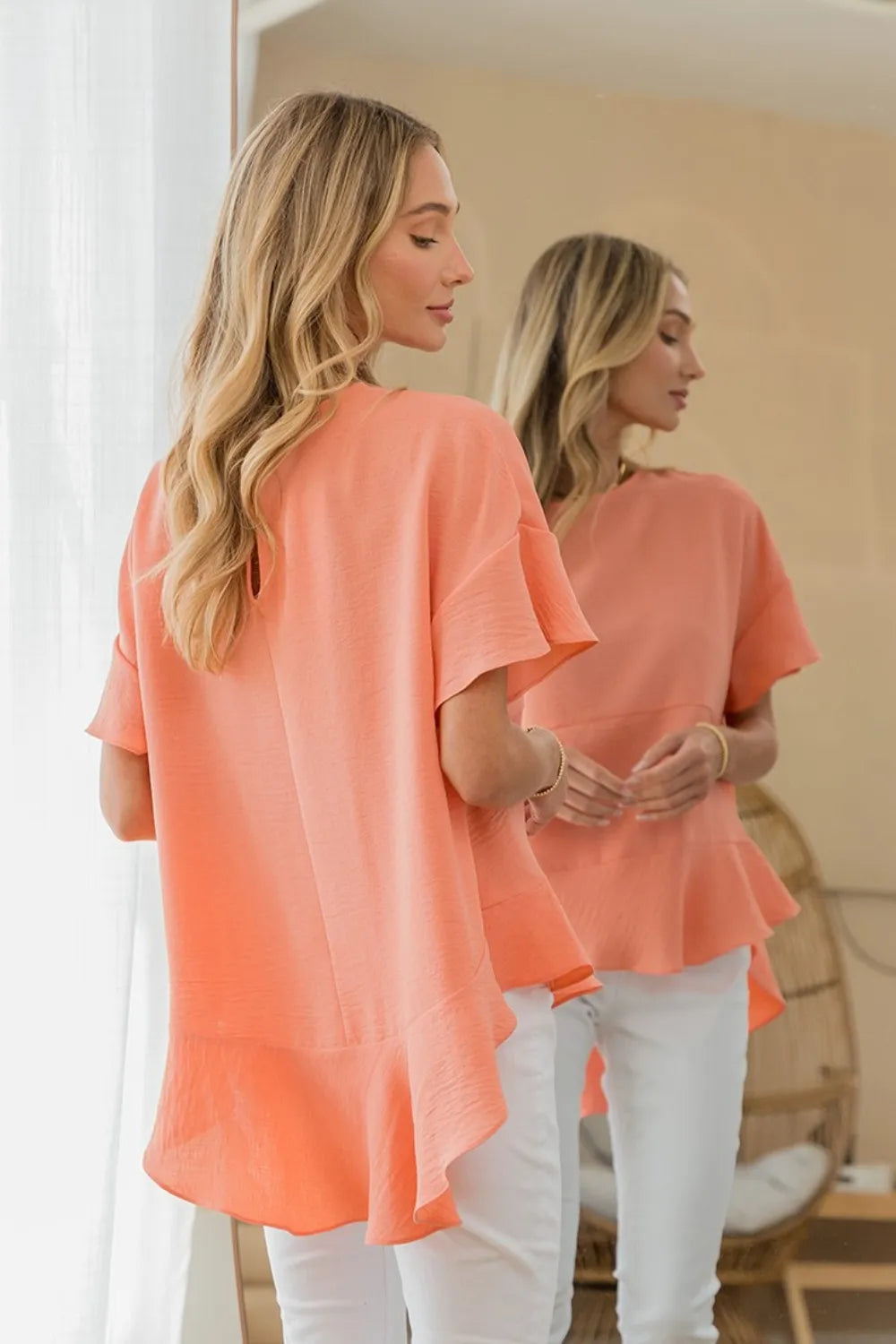 Sew In Love round neck ruffled top by Trendsi featuring a feminine design with ruffles and a classic round neckline.