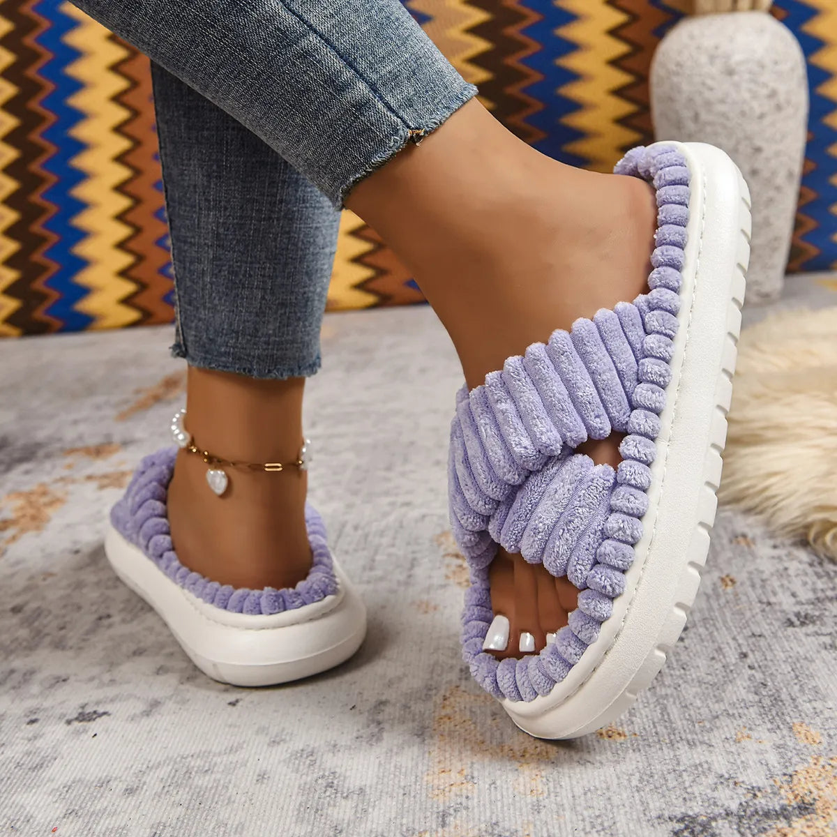 Crisscross open toe platform slippers by Trendsi featuring a stylish design and comfortable sole, shown in a side view.