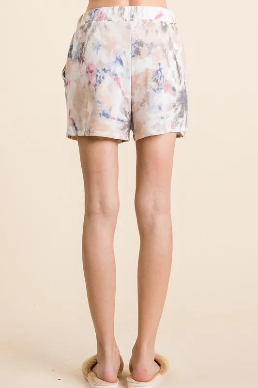 Colorful tie dye Terry shorts with drawstring waist from Trendsi, featuring a relaxed fit and comfortable design.