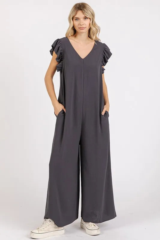 Trendsi Mittoshop V-neck ruffled cap sleeve wide-leg jumpsuit displayed with ruffled details and flowy fabric.