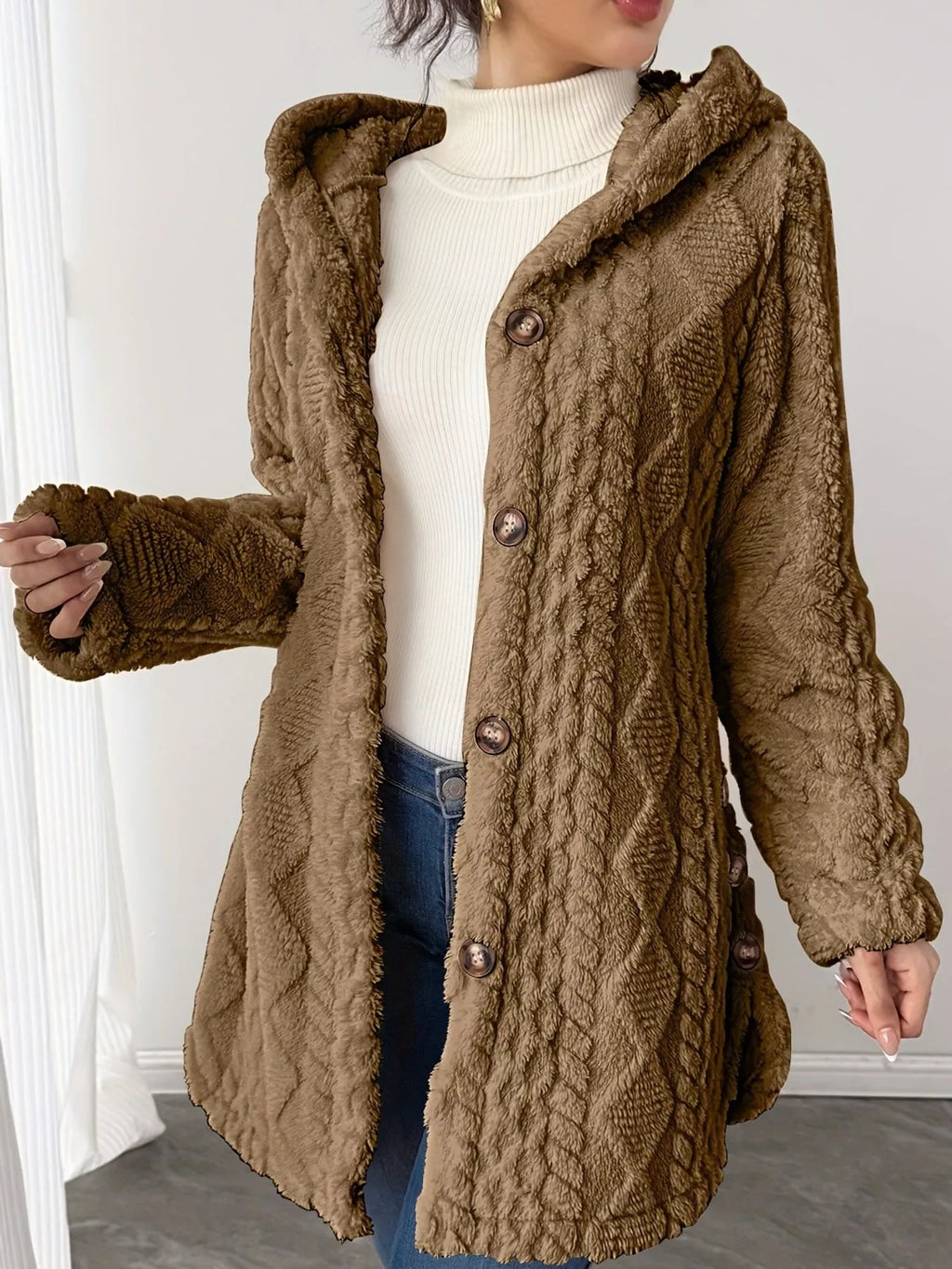 Plus size cozy cable-knit faux fur hooded outerwear by Trendsi, featuring a full-size, plush faux fur lining and cable-knit design.