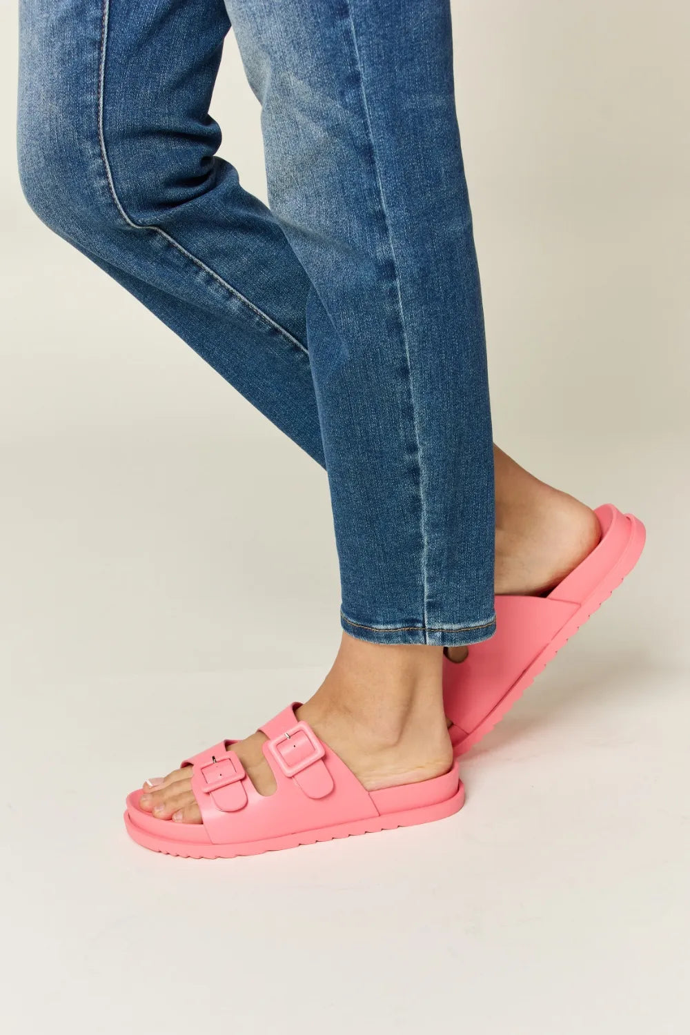 Open-toe Legend Double Buckle Sandals by Trendsi featuring stylish straps and buckle details on a casual summer footwear style.