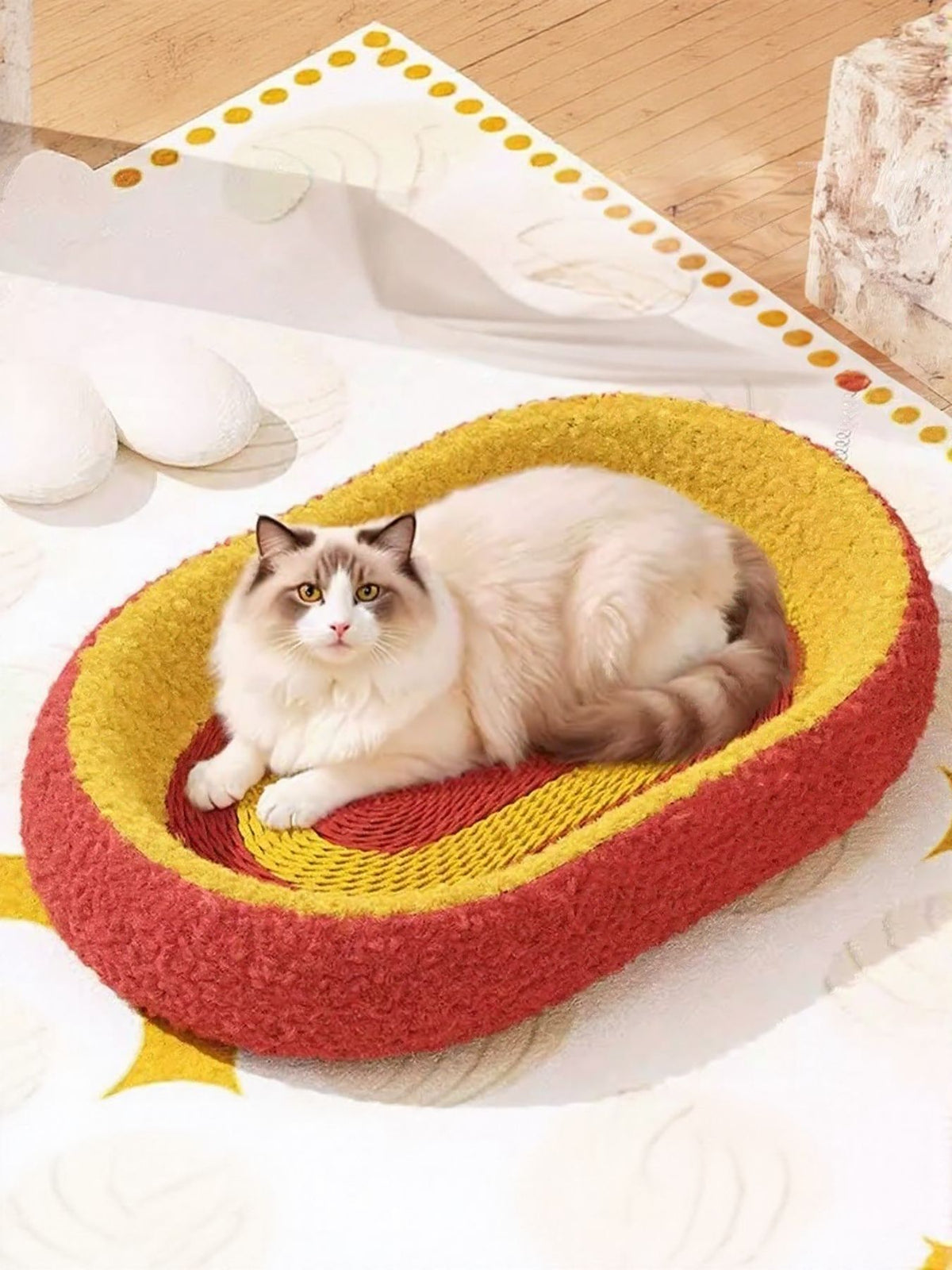 Oval cat scratching bed by Trendsi with soft fabric and sturdy structure, designed for cats to scratch and rest comfortably.