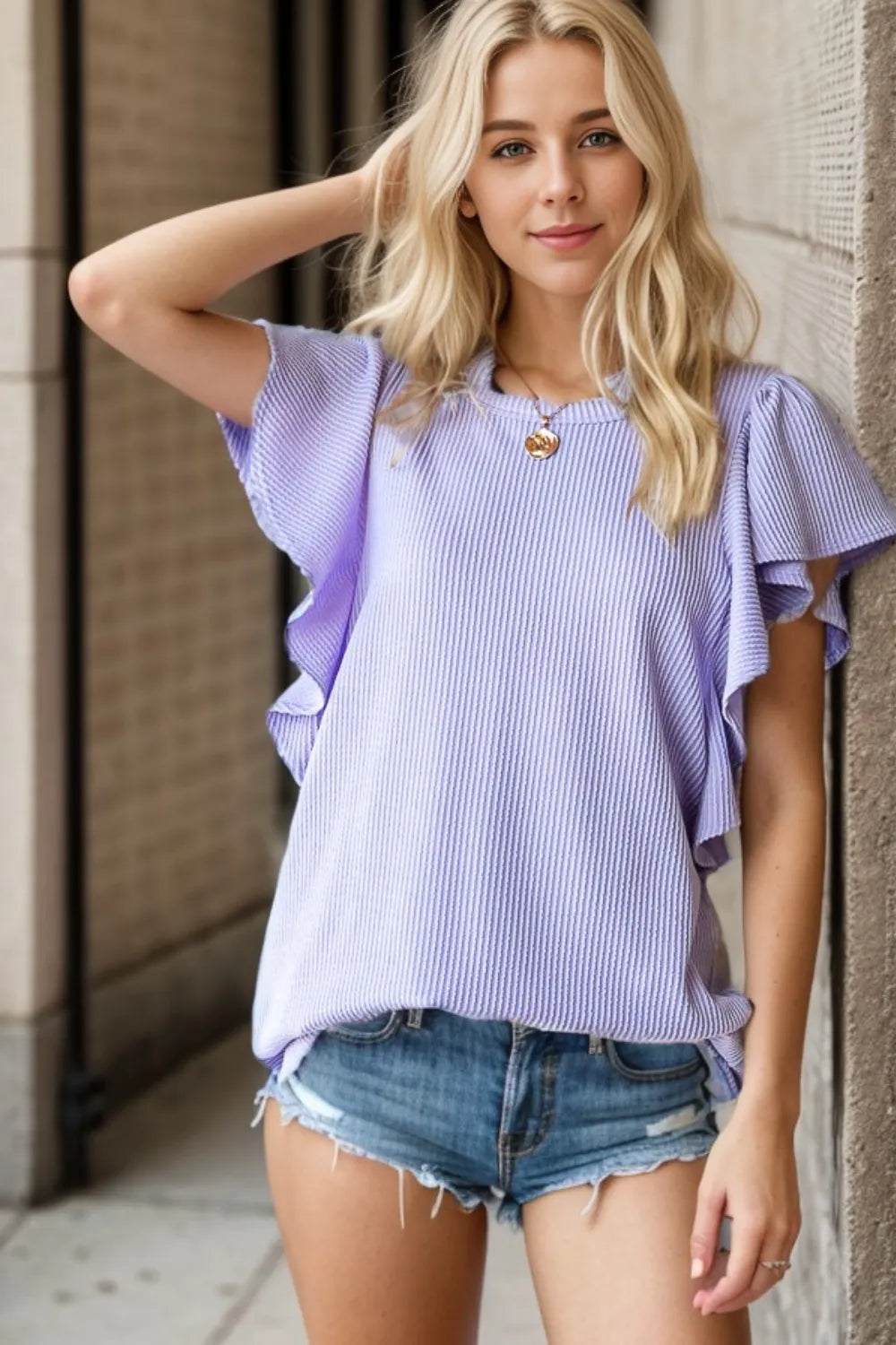 Heimish full size ruffled sleeve ribbed top in soft fabric, featuring a fitted silhouette and stylish ruffled sleeve details.