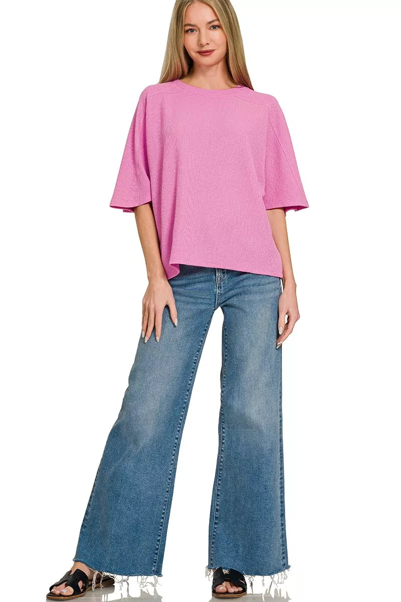 Zenana double knit short sleeve top from Trendsi, featuring a comfortable fit and soft fabric in a stylish design.
