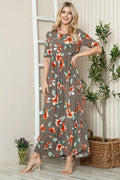 Trendsi BOMBOM floral round neck short sleeve maxi tee dress with colorful floral pattern and relaxed fit, displayed on a hanger.