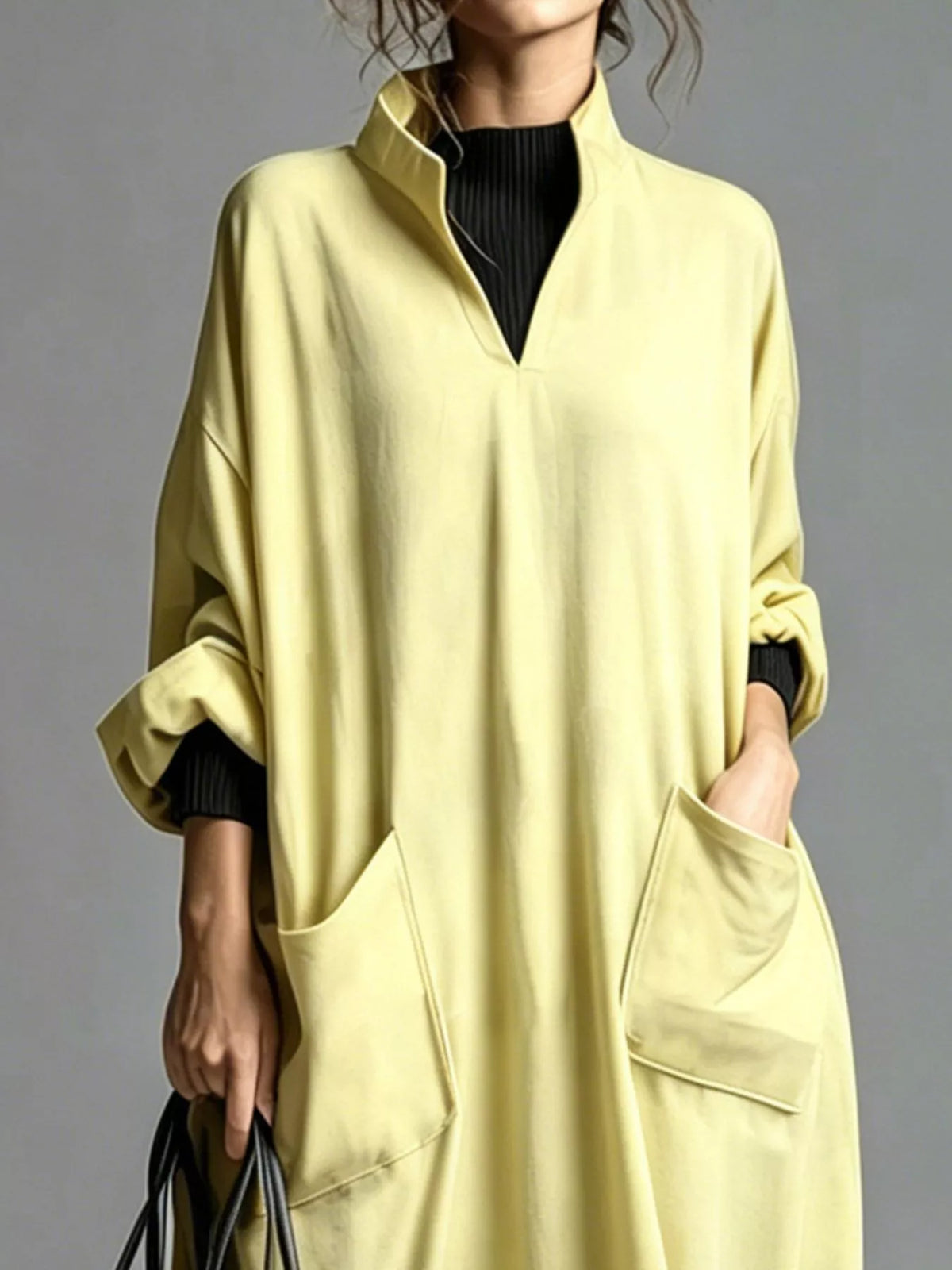 Plus size loose-fit mock neck midi dress with pockets by Trendsi, featuring a full size, comfortable and stylish design.