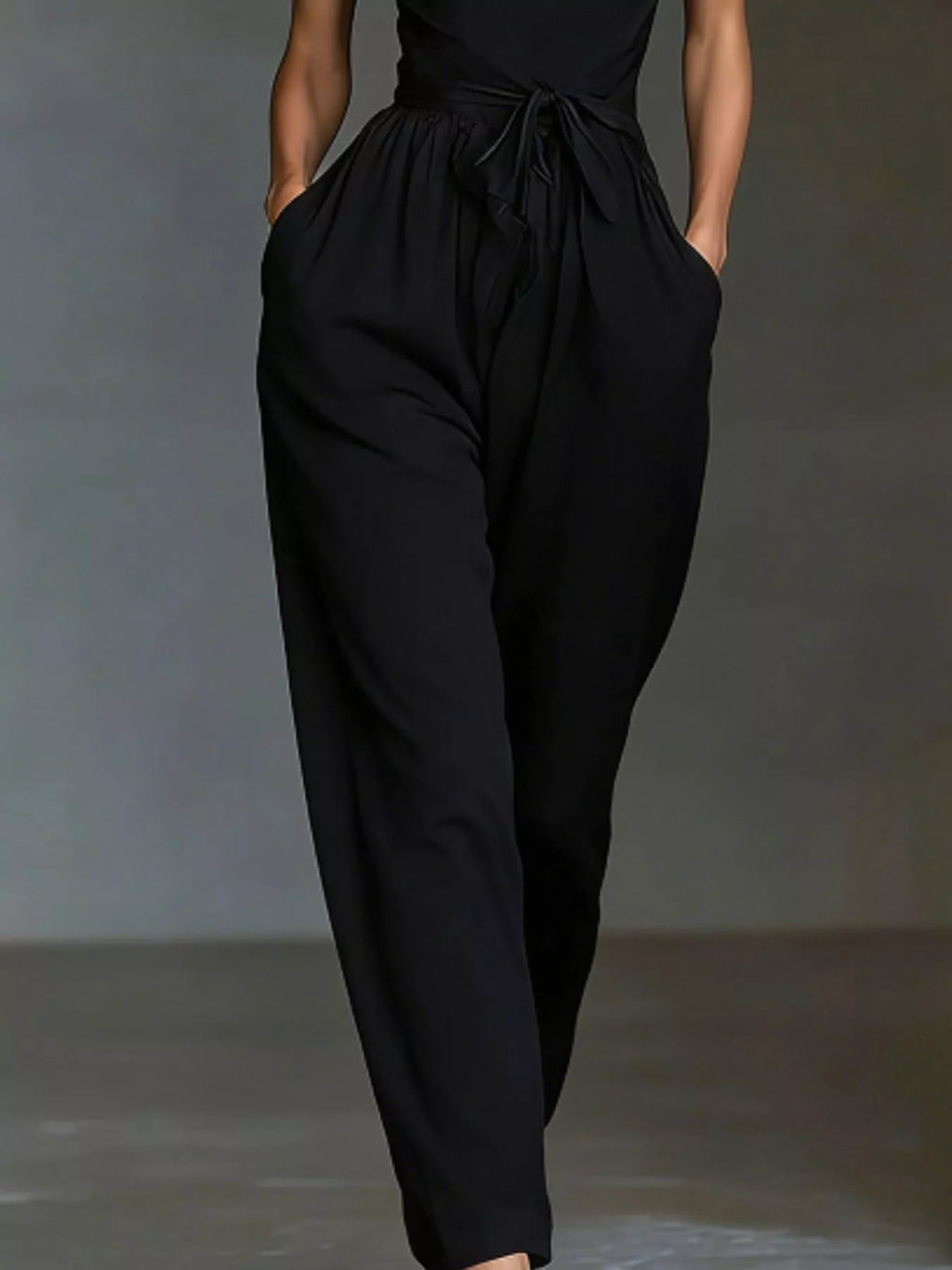 Halter neck wide-leg jumpsuit with waist-tie detail, stylish Trendsi women's fashion jumpsuit in soft fabric, full-length design