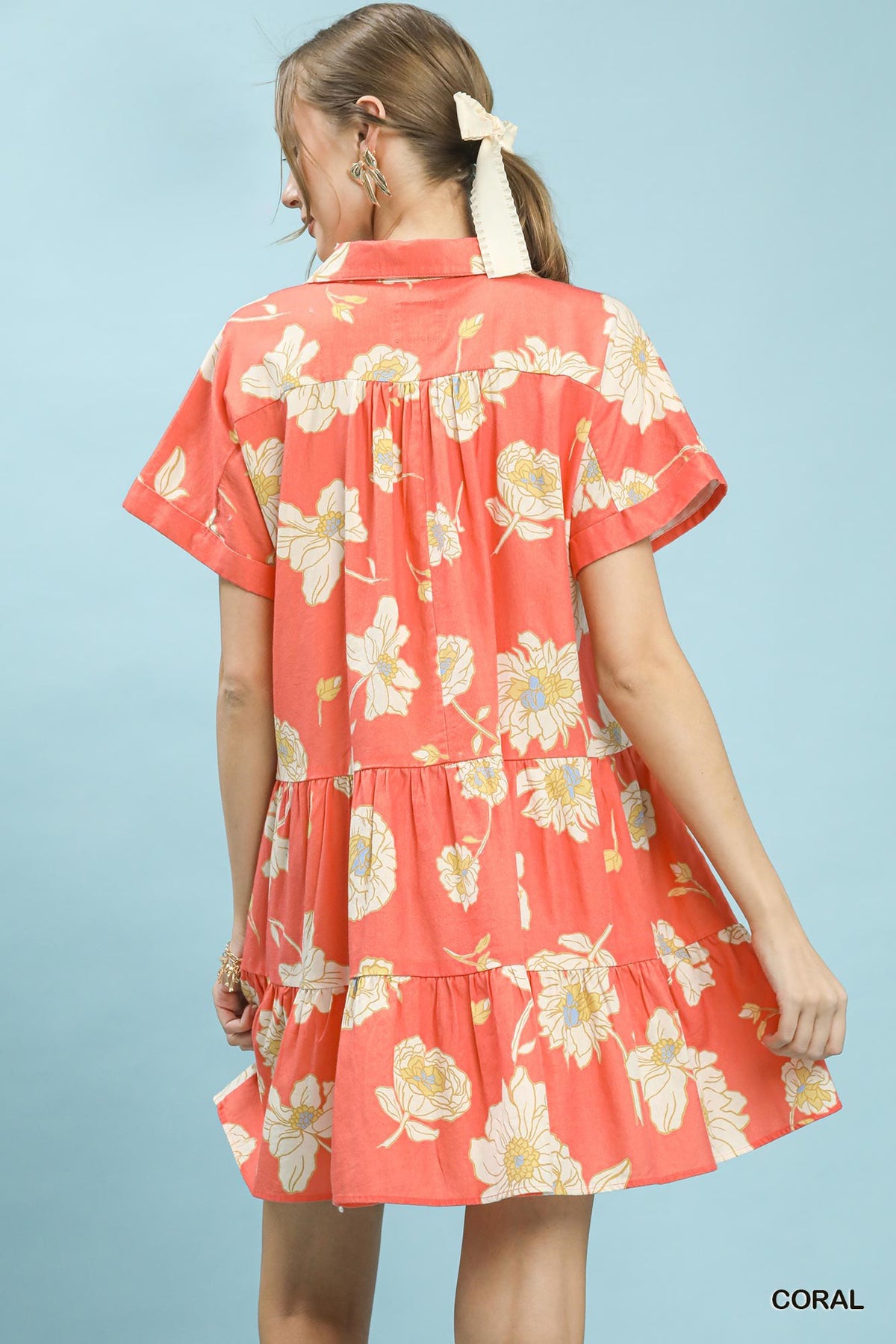 Umgee floral tiered babydoll dress with a collared neckline, featuring a feminine, flowy design and vibrant floral print.
