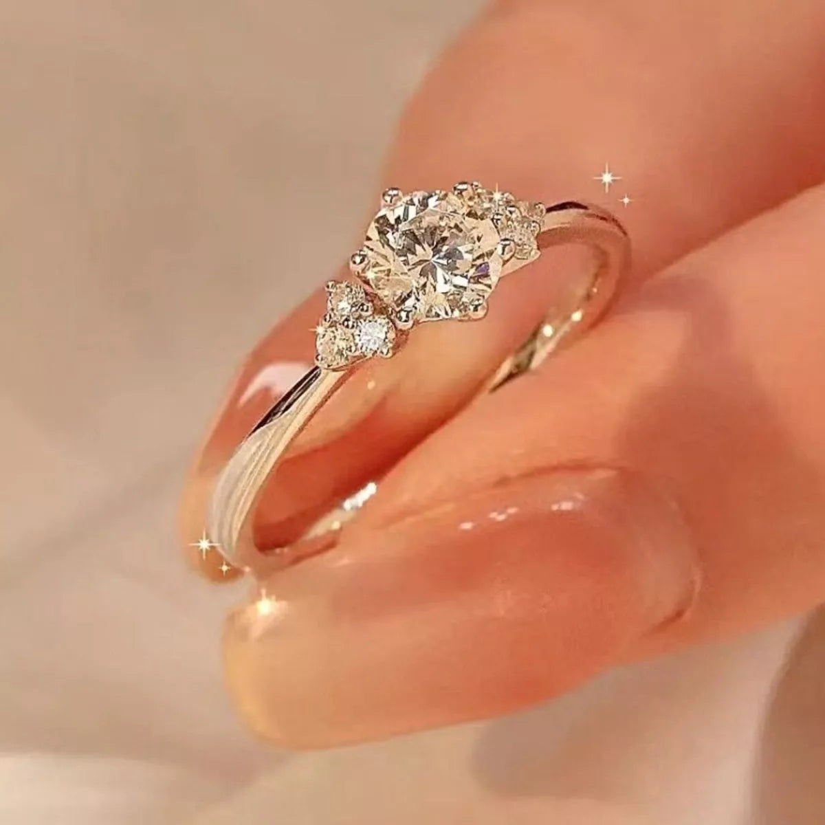 Sterling silver ring with 1 carat moissanite gemstone, elegant jewelry piece featuring a shiny, faceted design.