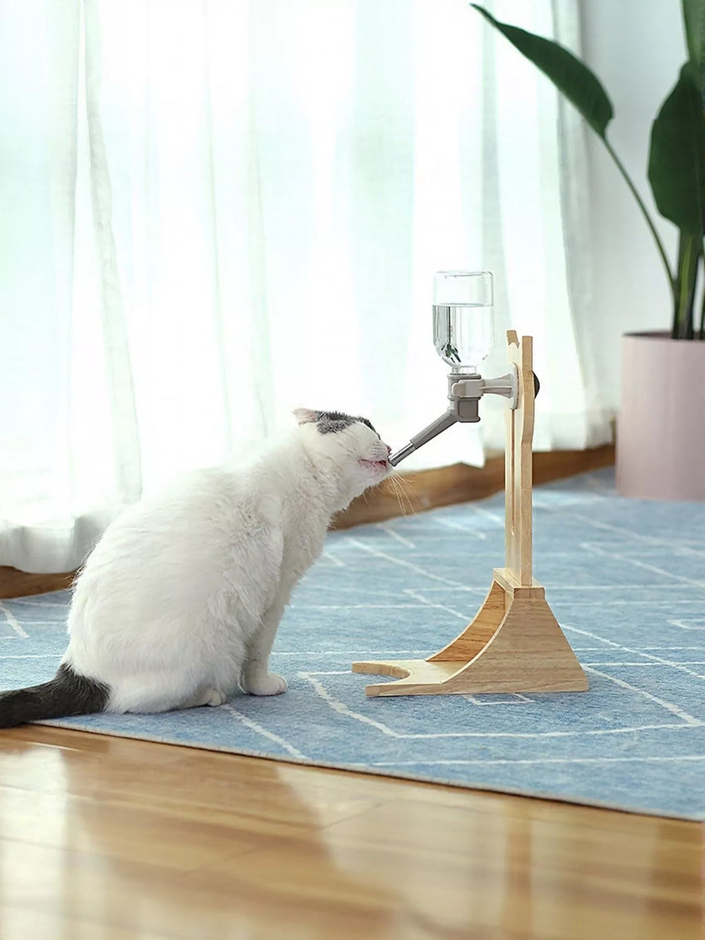Wooden pet water dispenser by Trendsi featuring a natural wood finish and a convenient built-in water bowl for pets.