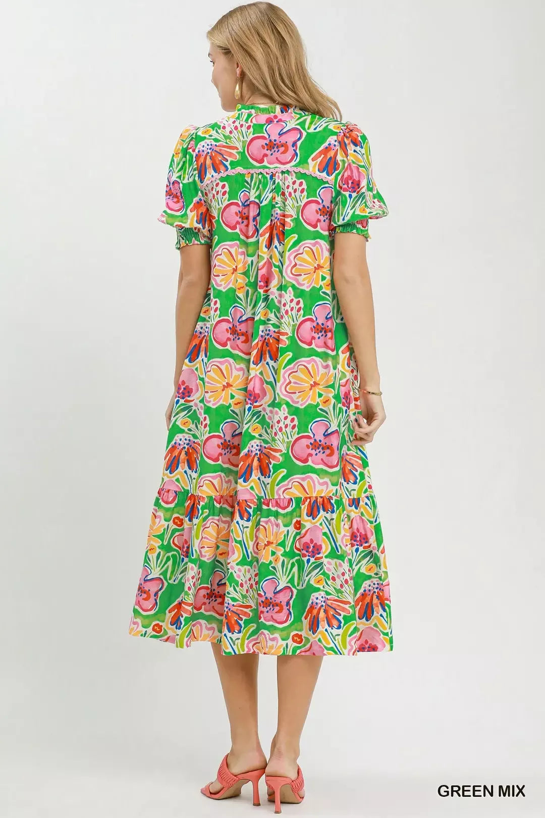 Floral print Umgee puff sleeve tiered midi dress featuring a feminine design and tiered skirt, perfect for spring and summer wear.
