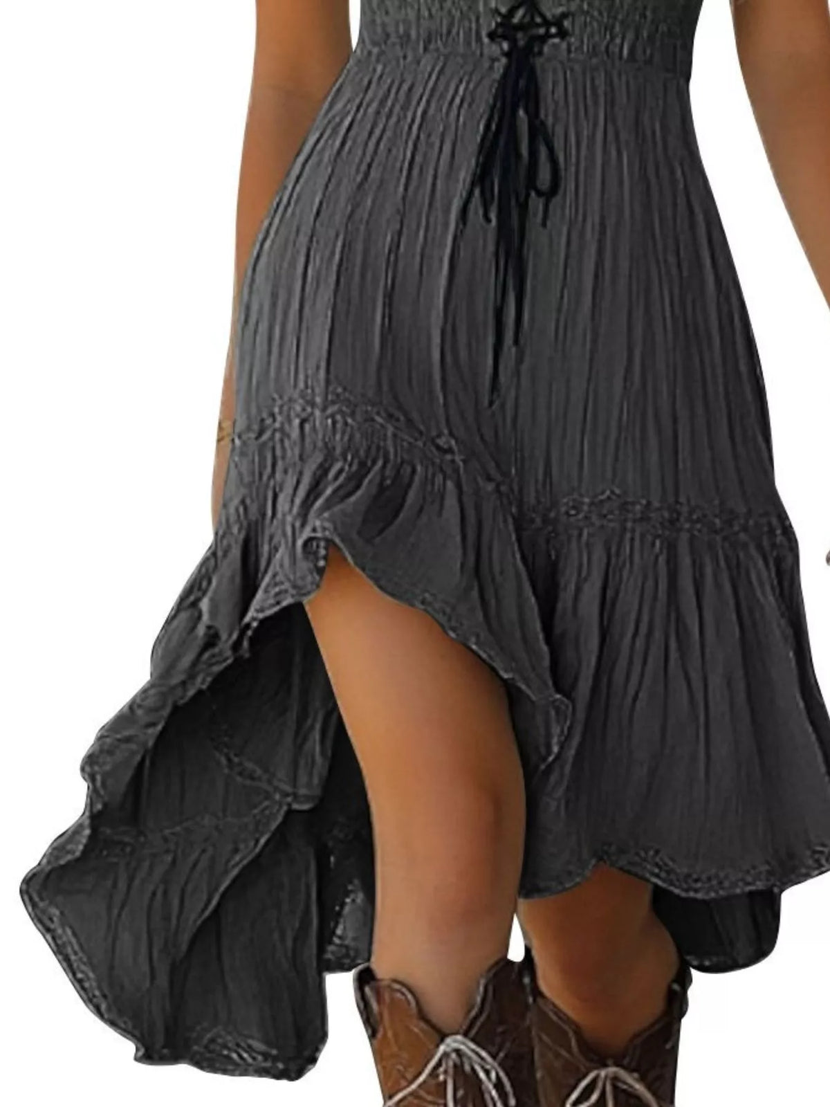 Lace-up front high-low ruffle hem dress by Trendsi featuring a stylish design and flowing fabric, ideal for casual or special occasions.