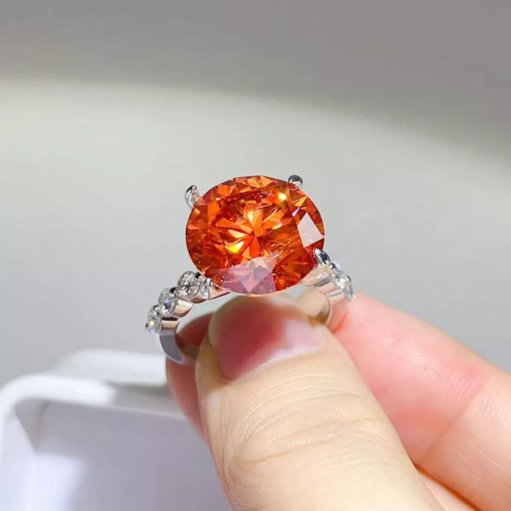 Sterling silver ring featuring a 10-carat moissanite gemstone, showcasing a sparkling and elegant jewelry design.