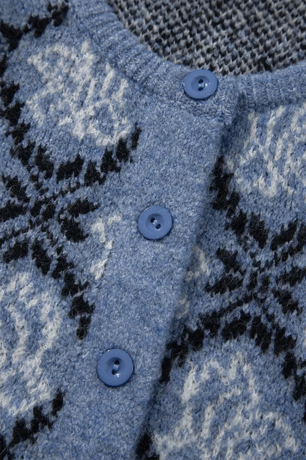 Boho knit short sleeve button-front top by Trendsi, featuring a casual, stylish design with a relaxed fit and textured fabric.