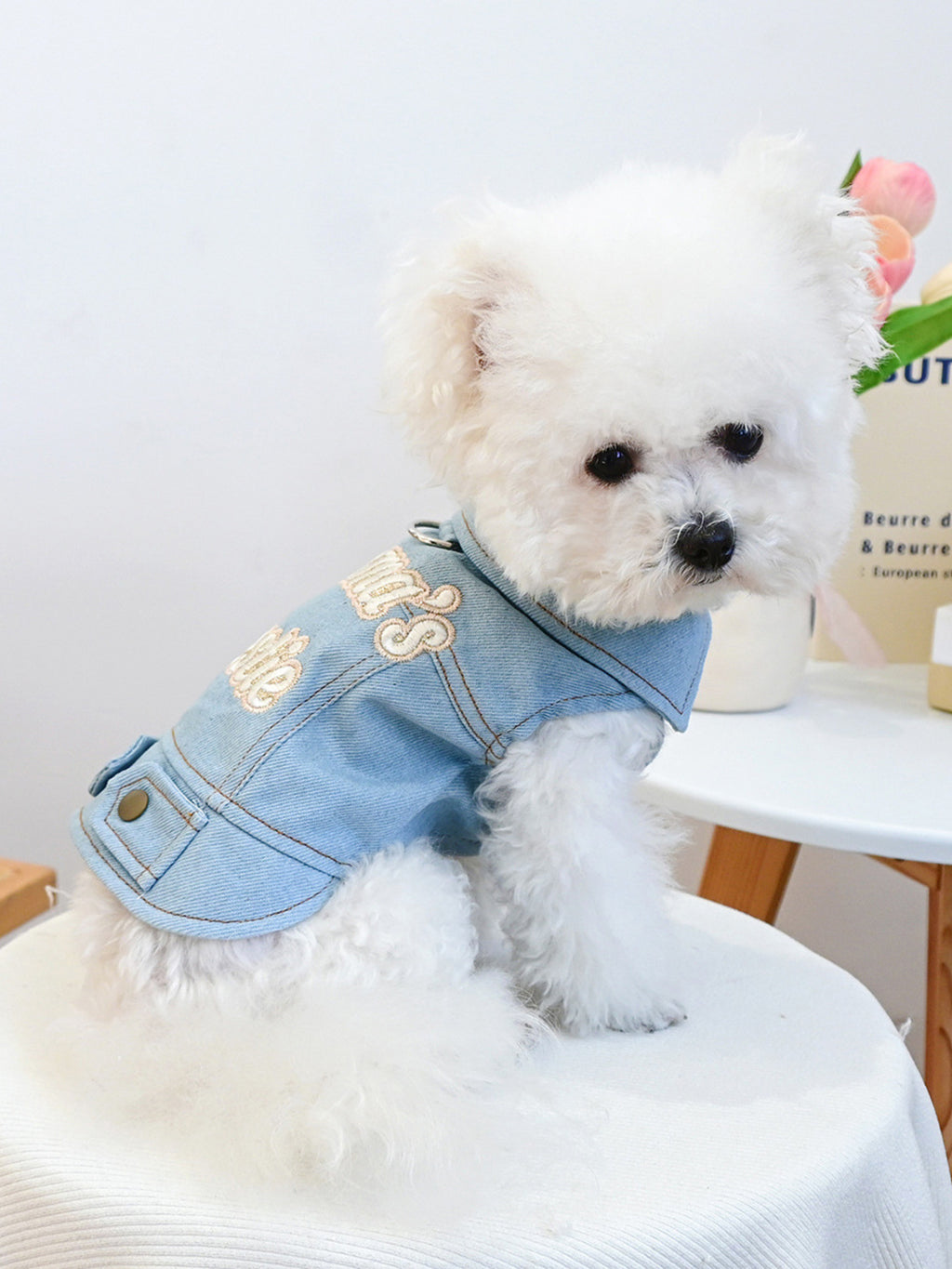 Embroidered denim pet jacket by Trendsi featuring colorful floral embroidery and a stylish, comfortable fit for pets.