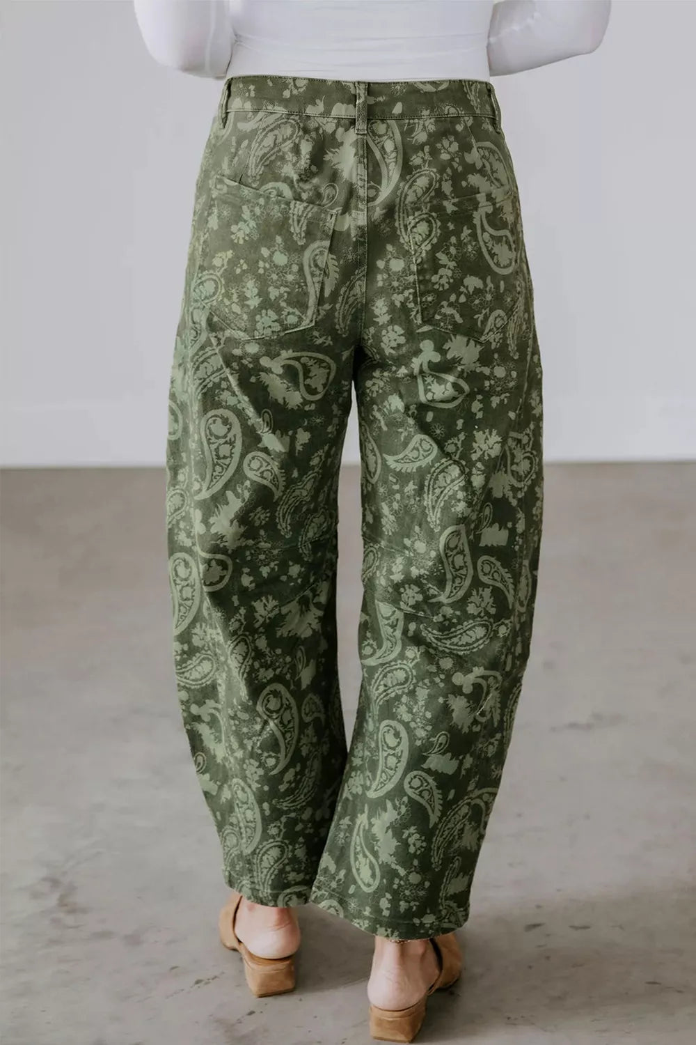 Paisley print harem denim pants from Trendsi featuring a relaxed fit, stylish design, and intricate paisley pattern in denim fabric.