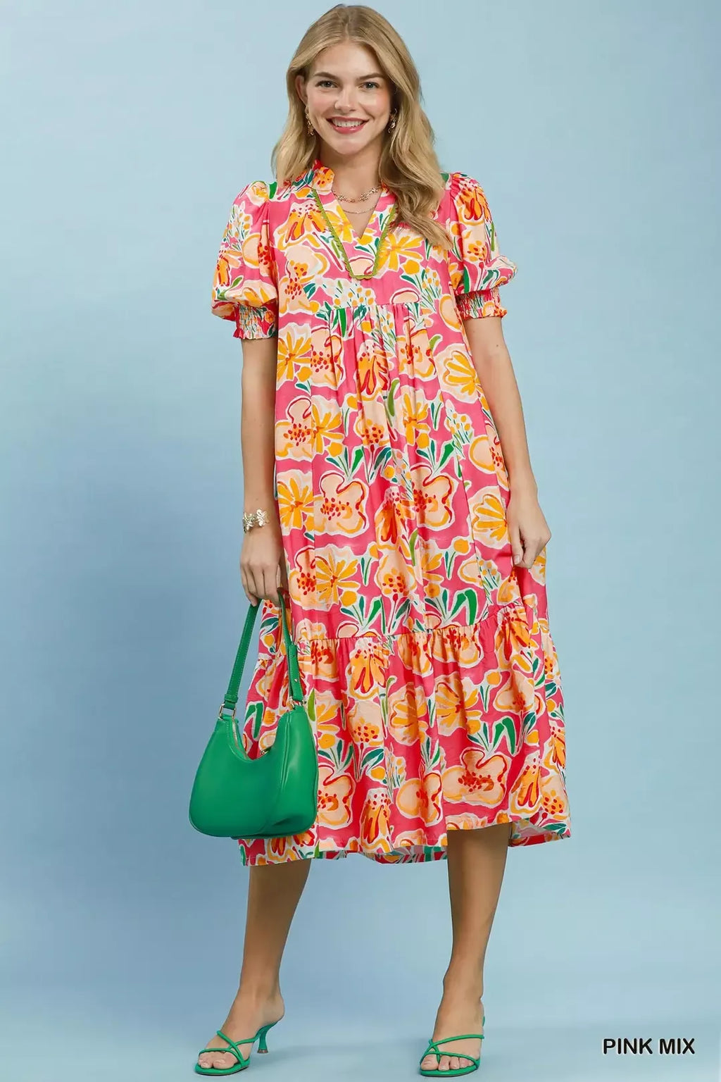 Floral print Umgee puff sleeve tiered midi dress with a feminine silhouette and tiered skirt, perfect for spring or summer wear.
