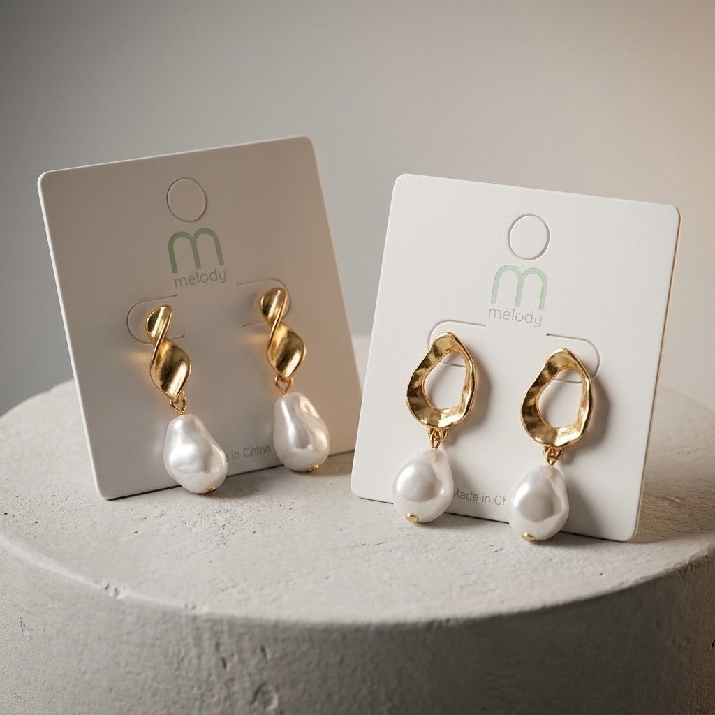 Pearl-inspired drop statement earrings detail for elegant occasion styling