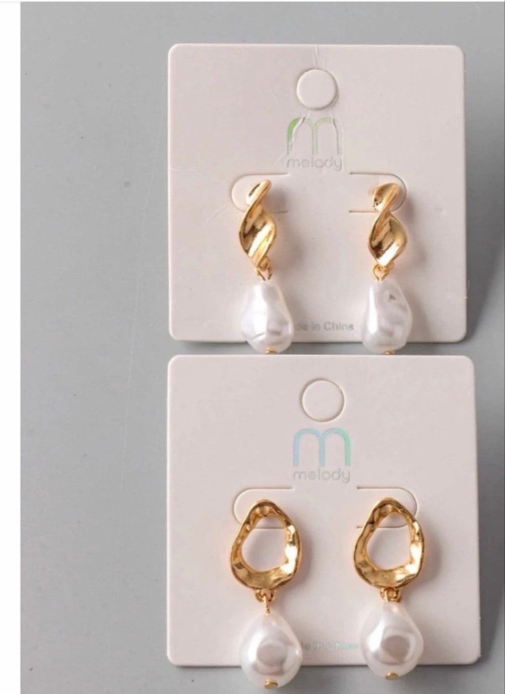 Statement pearl-inspired drop earrings for celebrations and dressy looks