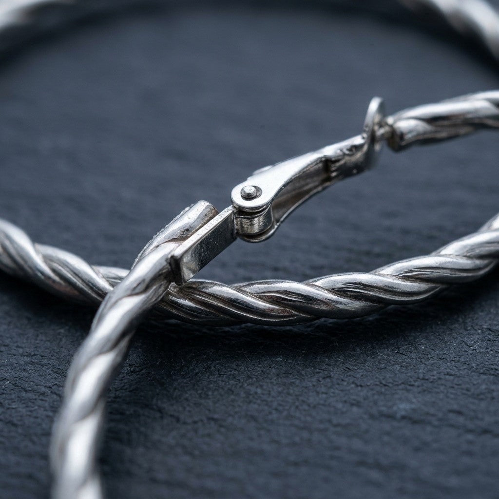Twisted Silver-Tone Hoop Earrings jewelry accessory by Padilla Innovations LLC