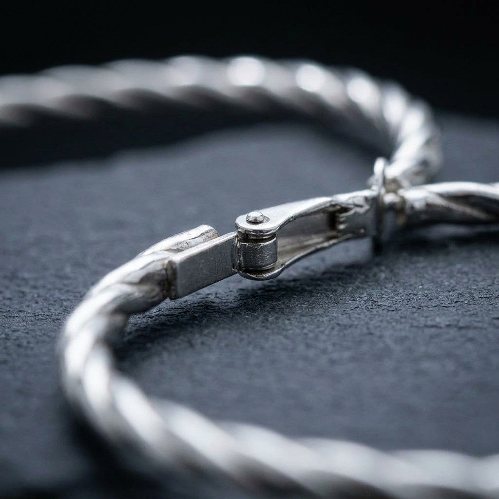 Silver-tone twisted hoop earrings detail for everyday fashion styling